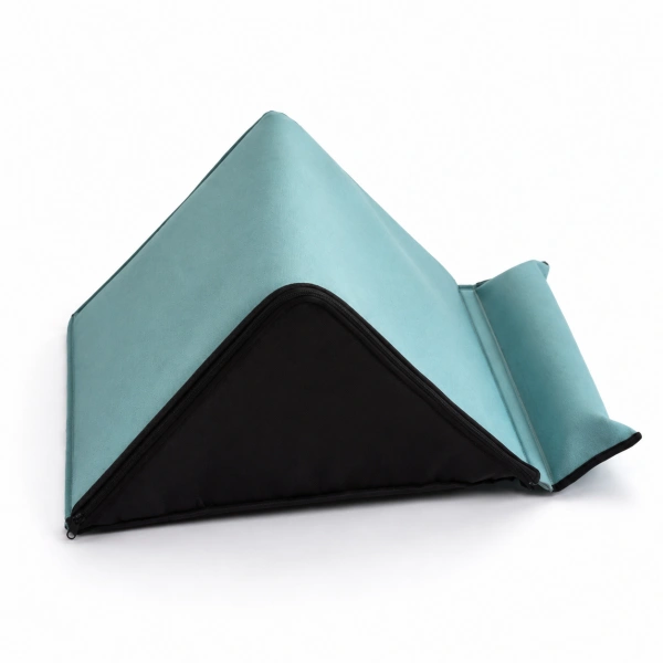 Triangular bed wedge pillow designed to provide comfortable support and positioning assistance for elderly users in bed.